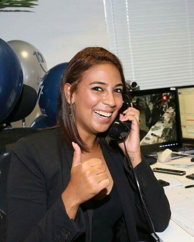 Cleo on the telephone for the charity drive