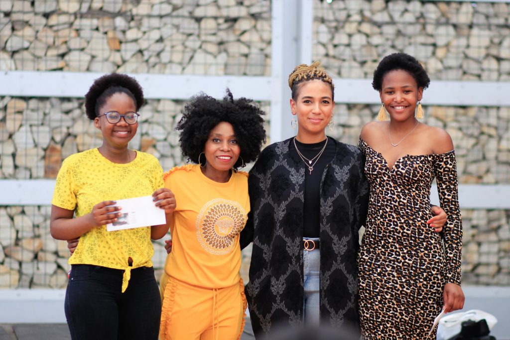 group photo taken at Hands of Luv